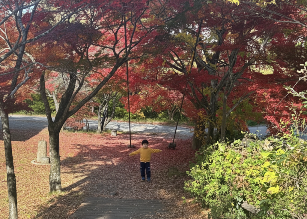 大井川の自然の中で紅葉を見ながら過ごす子ども